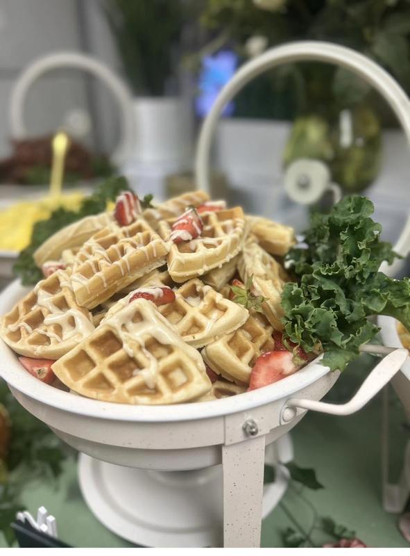 Flavor and Flair Catering brunch fresh strawberry waffles in elegant white tiered stand