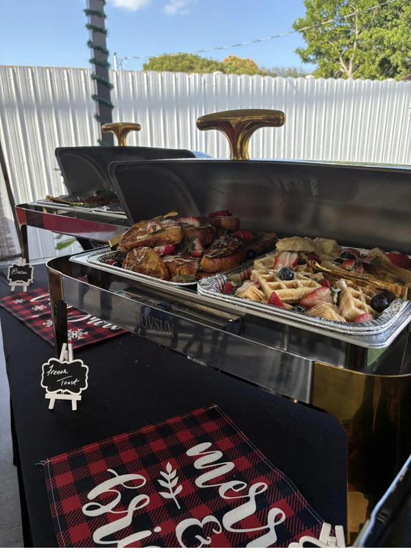 Flavor and Flair Catering holiday buffet setup with seasonal Southern comfort dishes